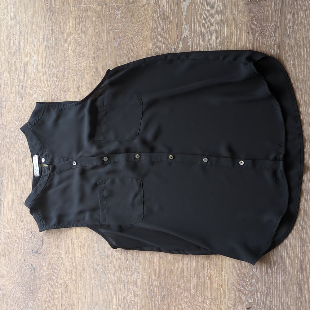 Freebird black women's sleeveless blouse. Size small